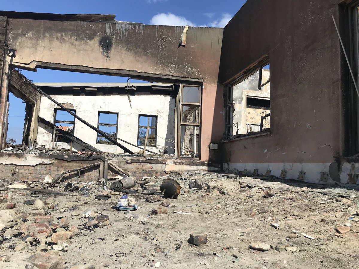 AthiMtongana's tweet photo. Residents are picking up the pieces after their homes burnt down. But the Overstrand municipality says flare ups have been picked up in #BettysBayFire and #KarwyderskraalFire #HermanusFire aerial and additional ground support has been dispatched. #OverstrandFire https://t.co/bGwXa6i4Ne