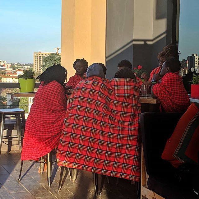 EcoRoamer's tweet photo. A group of friends wearing traditional #masaai blankets ("shuka's") on a rooftop bar playing Jenga.

#nairobi is an incredible cosmopolitan city in transition, blending the modern with the traditional. .
.
#kenya @baoboxcafe #friends #boardgames #saturda… https://t.co/sR1fzdUP7O https://t.co/wjC1guZgwP