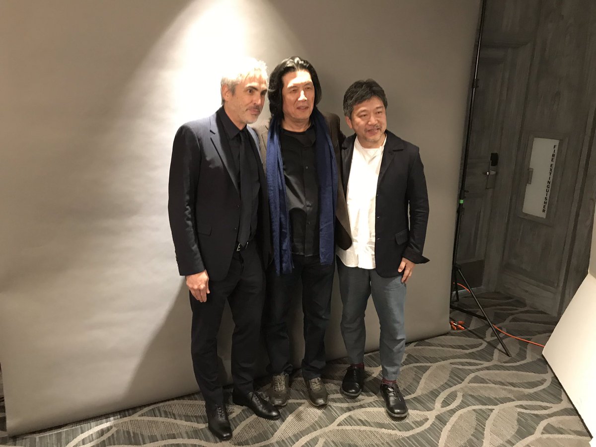 Directors Alfonso Cuarón, Lee Chang-dong and Hirokazu Kore-eda at the @LAFilmCritics awards dinner. #LAFCA2019