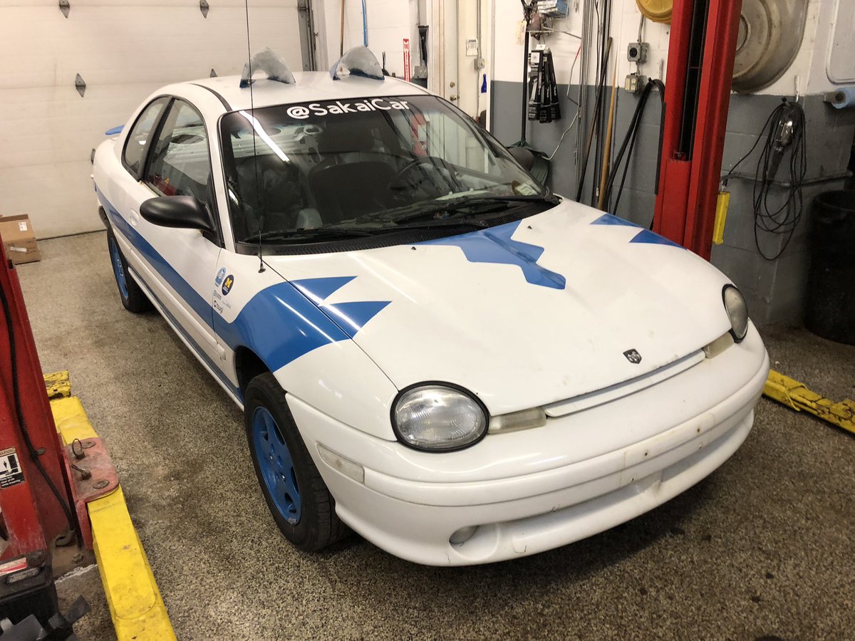 SakaiCar's tweet photo. Here are #Neon1 and #Neon2 being worked on getting ready for @24hoursoflemons in Joliet https://t.co/jp1utYIKfQ