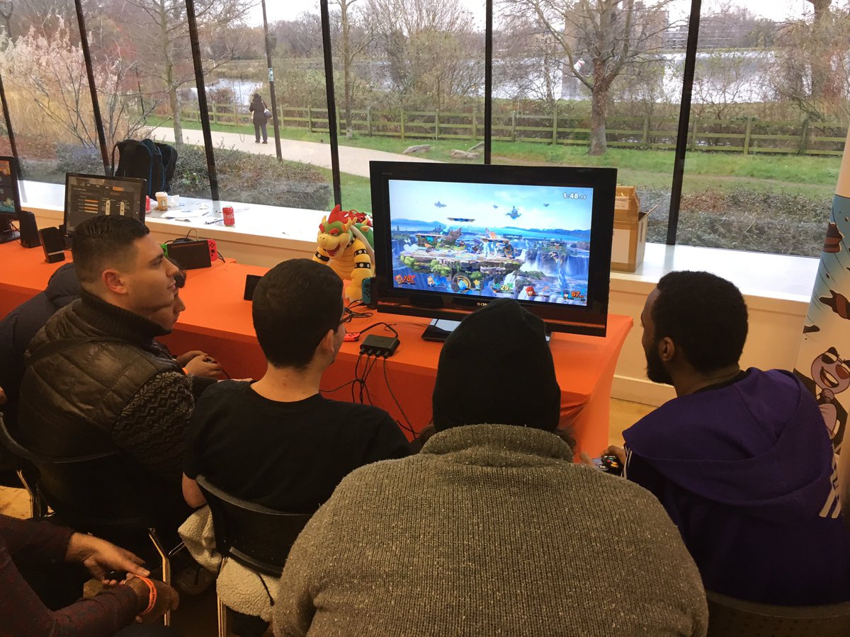 Batprime1's tweet photo. A week late, but here are part 1 of pictures of @mayamada GamePad last week. @Nintendo_Social and @MonHunOffline working on the Nintendo stands. https://t.co/gFLKW84fGx