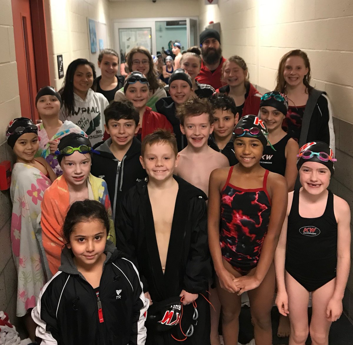 kwswimming's tweet photo. Our morning swimmers with Coach Jon (Coach Tim was the photographer) at the Age Group Open meet at Bethel Park! Swimming fast & having fun on this snowy day! #killerwhales #amsswimming #usaswimming #swimmeetsbringustogether #representkw https://t.co/2QVtRDZmnU