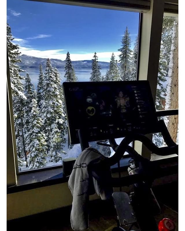 The picture windows at our chalet provide breathtaking views from the Peloton bike. In the living room set behind it, all you can see is the Peloton bike.