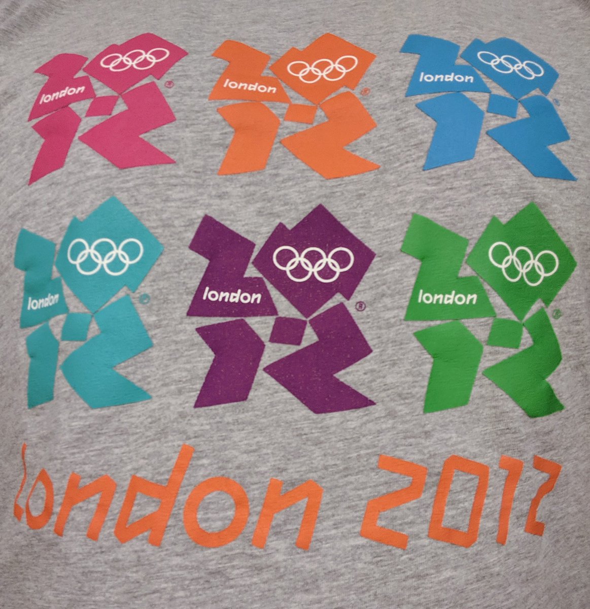 rjankie's tweet image. What were they thinking when designing this logo ? Found my old official London 2012 t-shirt #Olympics #cannotunseeit