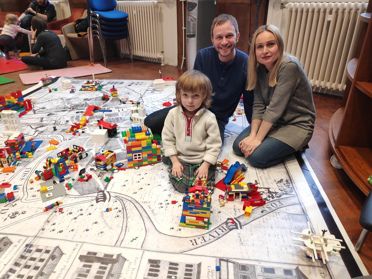 YorkArchivesUK's tweet photo. Fun for all the family @YorkExplore. Here's Jude and his parents making the most of #MapAttack #ResFest19 @YorkLibrariesUK https://t.co/y9qRK9BRic