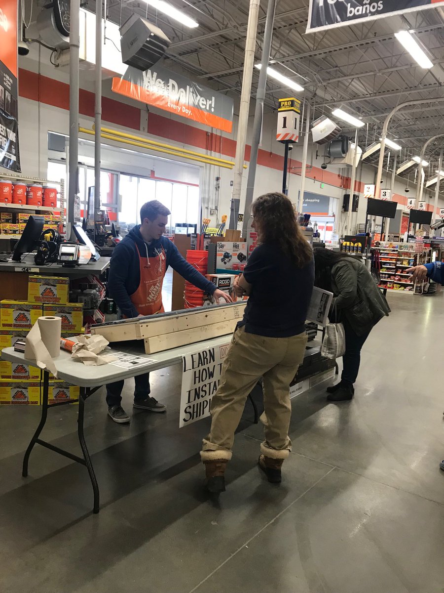 Chris teaching how to install shiplap here at 4803.