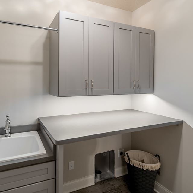 NewtonLighting's tweet photo. Laundry room folding table. Even though there is a ceiling #light the cabinet casts a shadow over the table and was extremely dark. We utilized a #LinearLED fixture placed to the front of the cabinet, making the area bright. 4000k neutral white with 95 c… https://t.co/G0rFAJb9Ub https://t.co/FtA5RxiO1G
