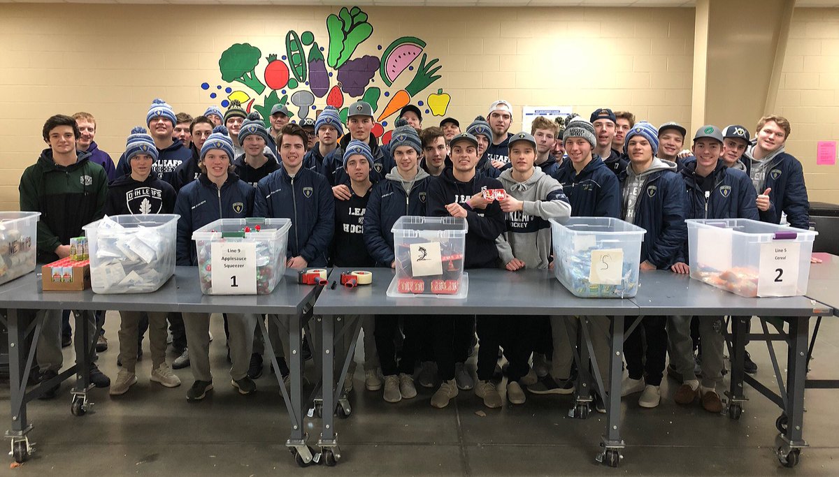 DMOakLeafs's tweet photo. Thank you to the Northeast Iowa Food Bank in Waterloo for hosting us. During our road trip this weekend the boys stopped by and are volunteering to pack bags for the after school backpack food program. The boys filled nearly 800 packs! Thank you for making a difference, men! https://t.co/BGrjE1XjsX