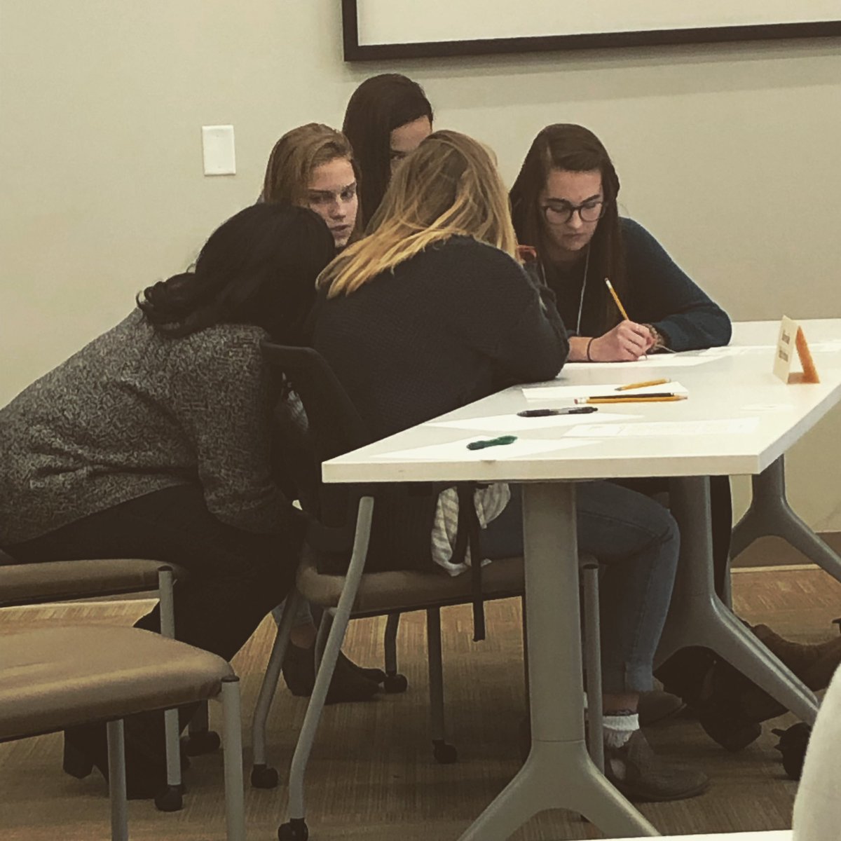 MrsLBeam's tweet photo. Conferring about the ethics of gerrymandering... they made the top 2 and are getting ready to compete in the final round of the SC HS Ethics Bowl! #inauguralethicsbowl #warriorway @RHSTribeChat @woffordcollege https://t.co/xx1SaNGqm6