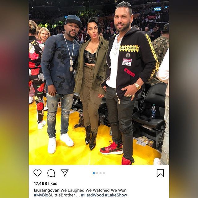 TheYBF's tweet photo. #FloydMayweather snapped a pic with #LauraGovan courtside at a #Lakers game. Money Mayweather also had a new chick on his arm. Check it here: https://t.co/V3RyxrImYy or swipe up in stories https://t.co/uF0D6Yxx7g https://t.co/60puyFS3fx
