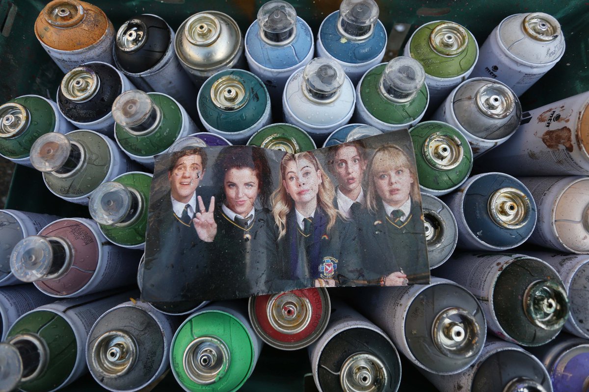 lorcanphoto's tweet image. A well deserved pint - The superb @uvartscic finish the Derry Girls mural at Badger's Bar, Orchard Street, Derry.