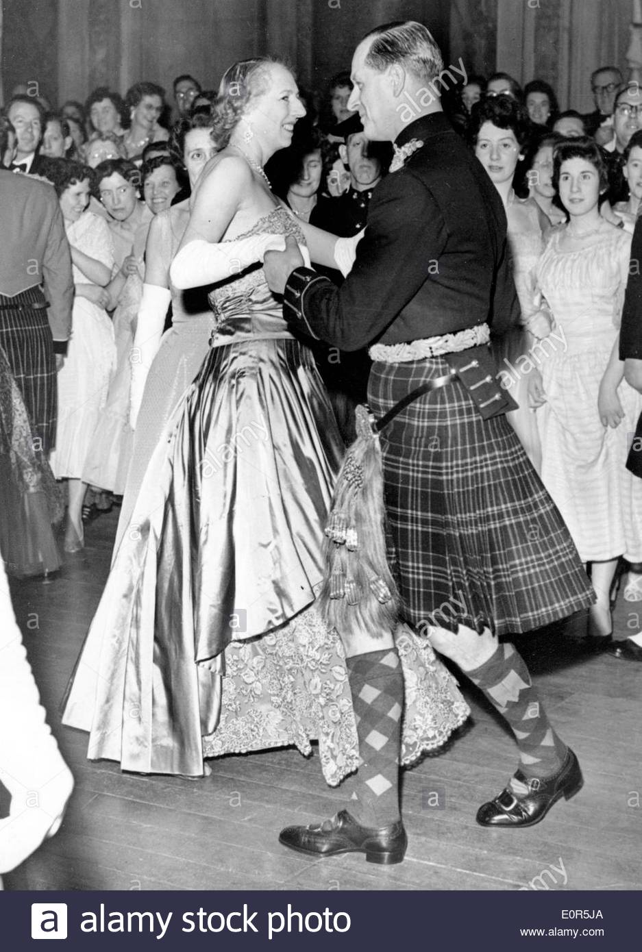 Queen Elizabeth II dancing with Prince Philip Stock Photo - Alamy