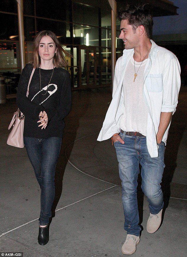 NessaLovesHS's tweet photo. Can we talk about how lowkey and cute zac efron and lily collins are https://t.co/ApIkapO624