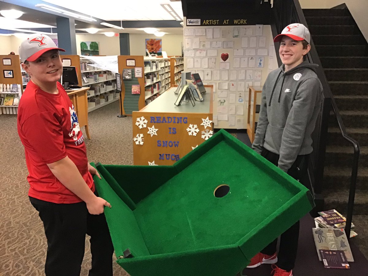 FYBCYN's tweet photo. After a quick round of mini golf, these guys made quick work putting the course away at the public library’s annual Mini Golf Fun Raiser! Thanks for volunteering. #FoxPride https://t.co/hBsv09N8Vo