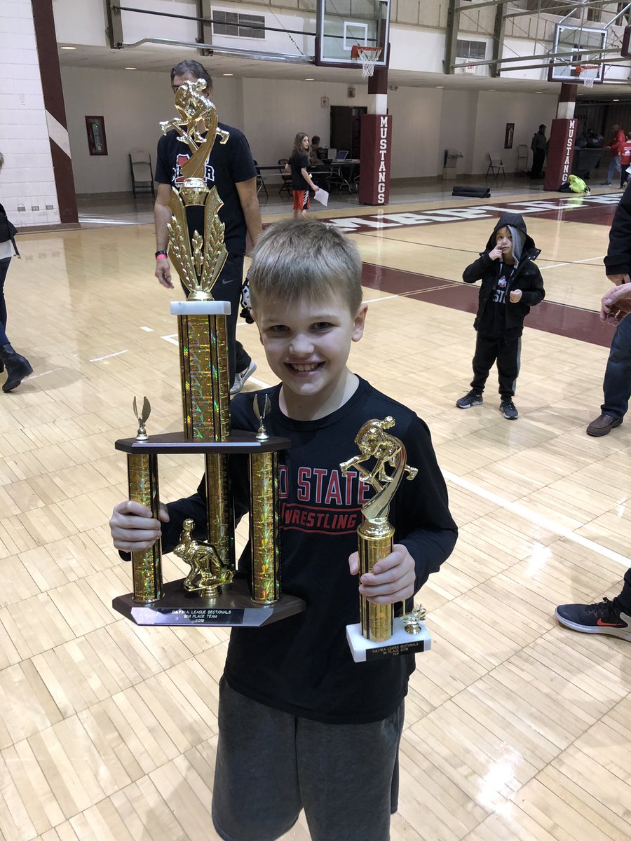 First time wrestling sectionals and this kid took 🥇🏆! <a href="/MentorYWC/">Mentor Youth Wrestling Club</a> took second and Corbin got a chance to take a picture with both trophies!! #proudmom #onceacard future of <a href="/MentorWrestling/">Mentor Wrestling</a>