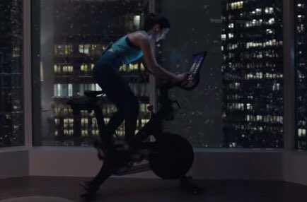 I put my Peloton bike in the center of the panoramic living room window in my New York penthouse