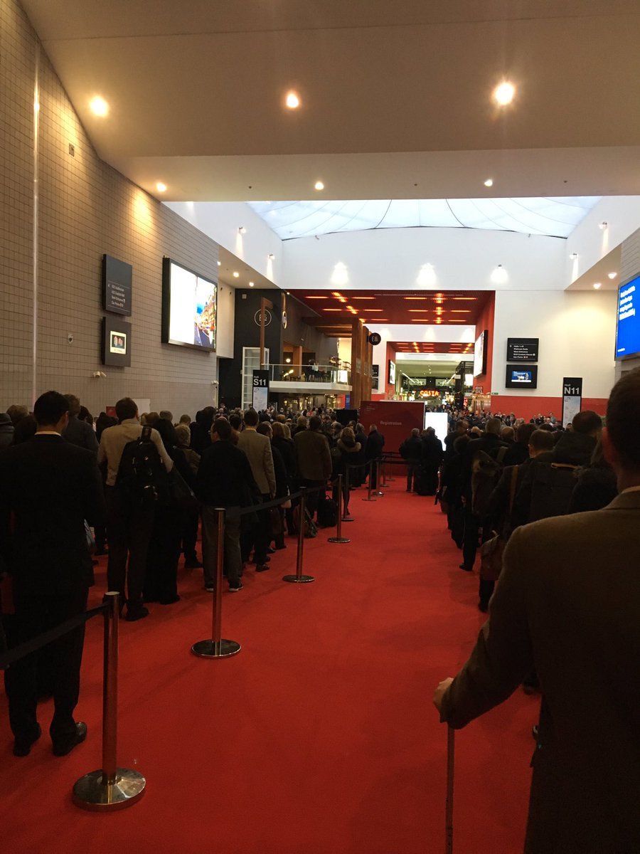 domcat's tweet image. Huge queue for Oracle #OpenWorld registration at London this morning