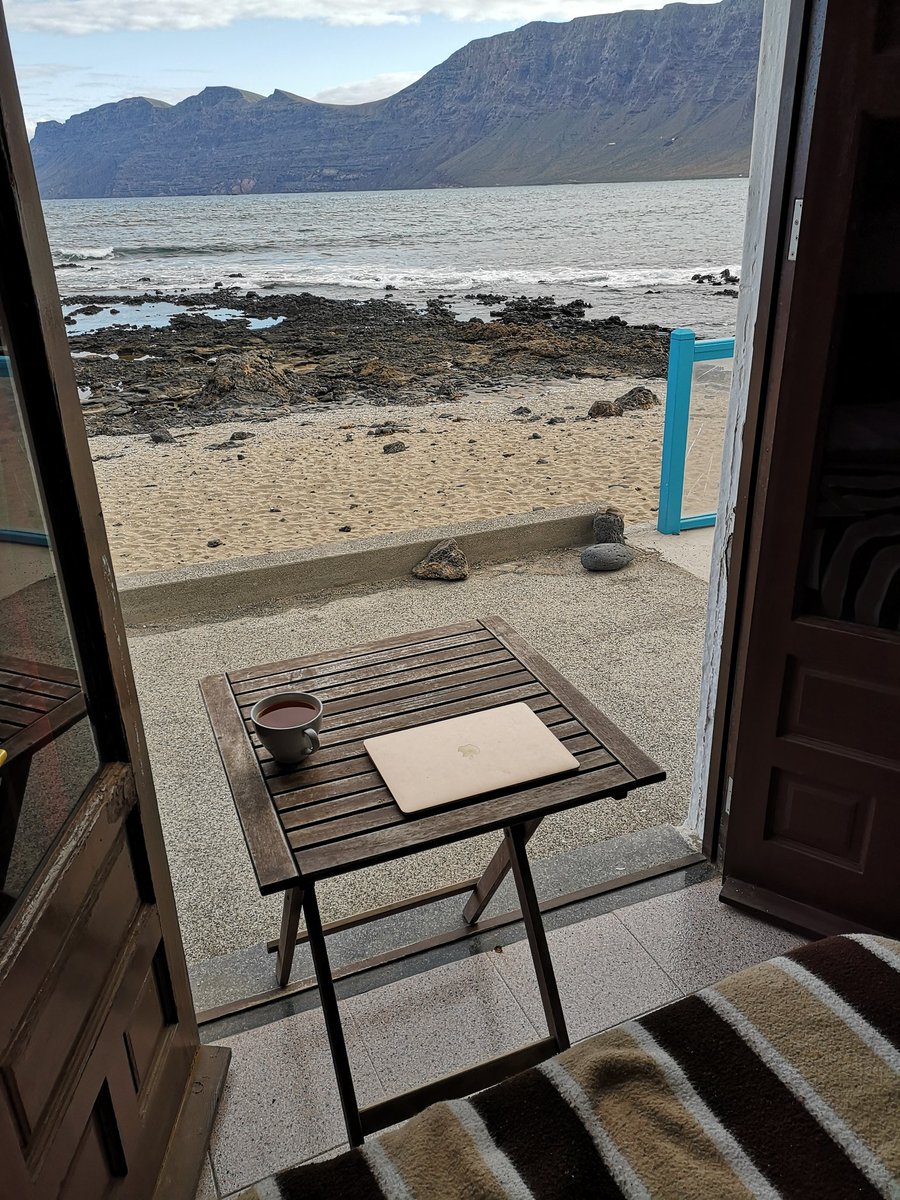 A_J_Lester's tweet image. My desk for the day. Cheap room, EPIC view. #Lanzarote #amwriting #alittlebit