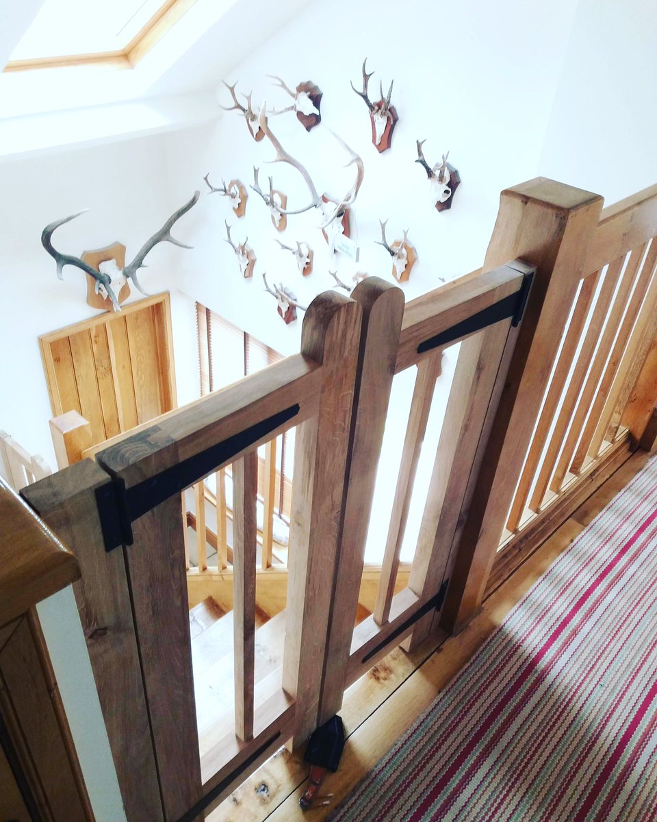 #Bespoke stair gate made from #EnglishOak to match staircases