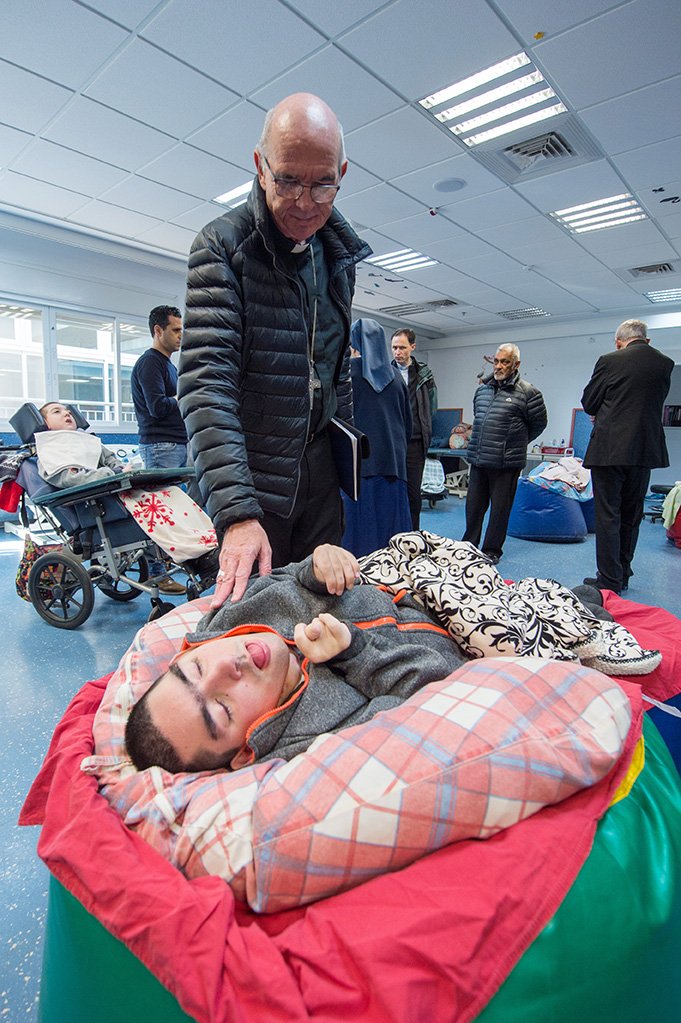 catholicEW's tweet photo. #picturesoftheday Inspirational example of Religious sisters in their care for disabled children at the Maison du Sacre Coeur in Haifa #hlc19 https://t.co/agOb2Bcim3