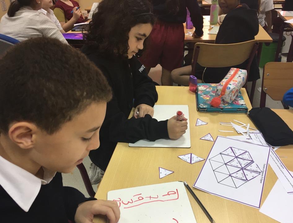 Students are problem solving through fractions of amounts using Tarsia jigsaw puzzles #RafflesISmaths
