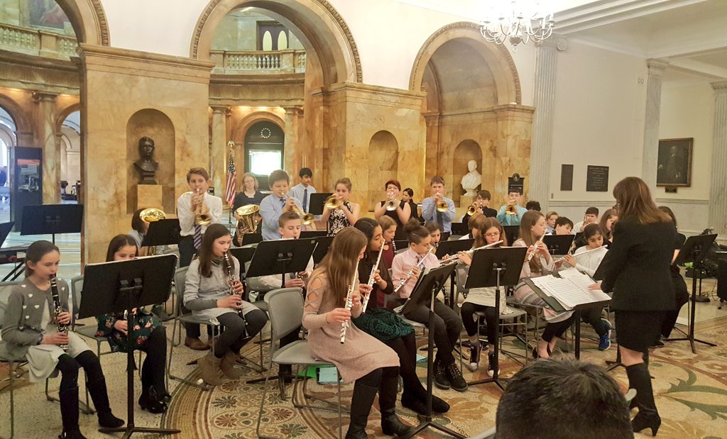Band members from Spofford Pond Elementary School in Boxford get quite the thrill, as their music echoes through halls of the MA Statehouse. This is the 13th year in a row they've played there. One student tells me it's very cool to play at the statehouse and it's also echoey.