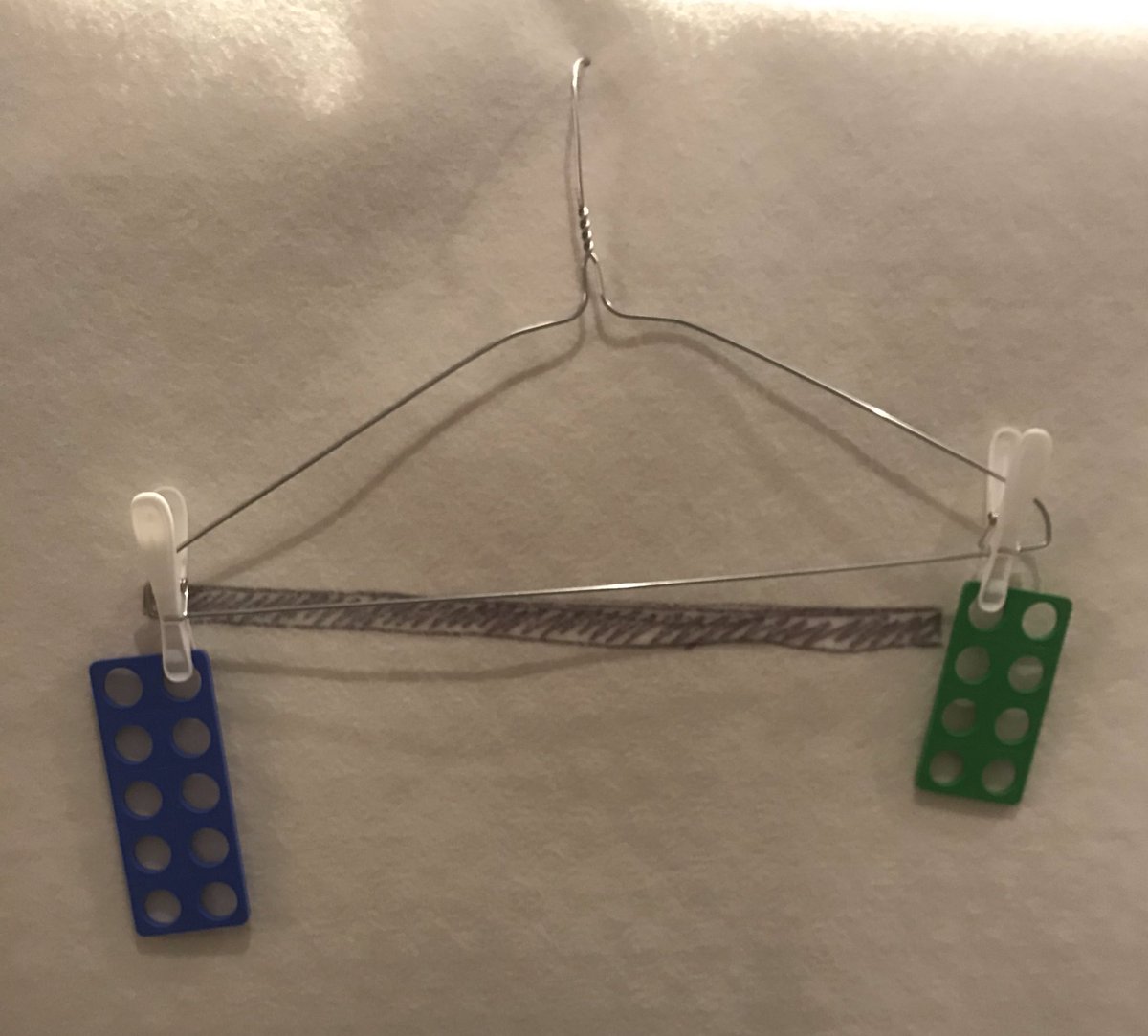 clevercounting's tweet photo. #DIYresources for today is super simple. A wire coat hanger and pegs makes a great balance with which to explore greater/ less than and scaffold missing number calculations. For more ideas go to https://t.co/WfVnqFpJVK #clevertips https://t.co/wFPJxZBakj