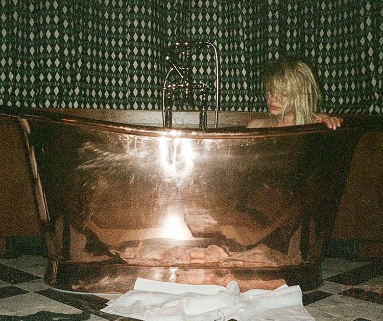 Boo enjoying the new tub!