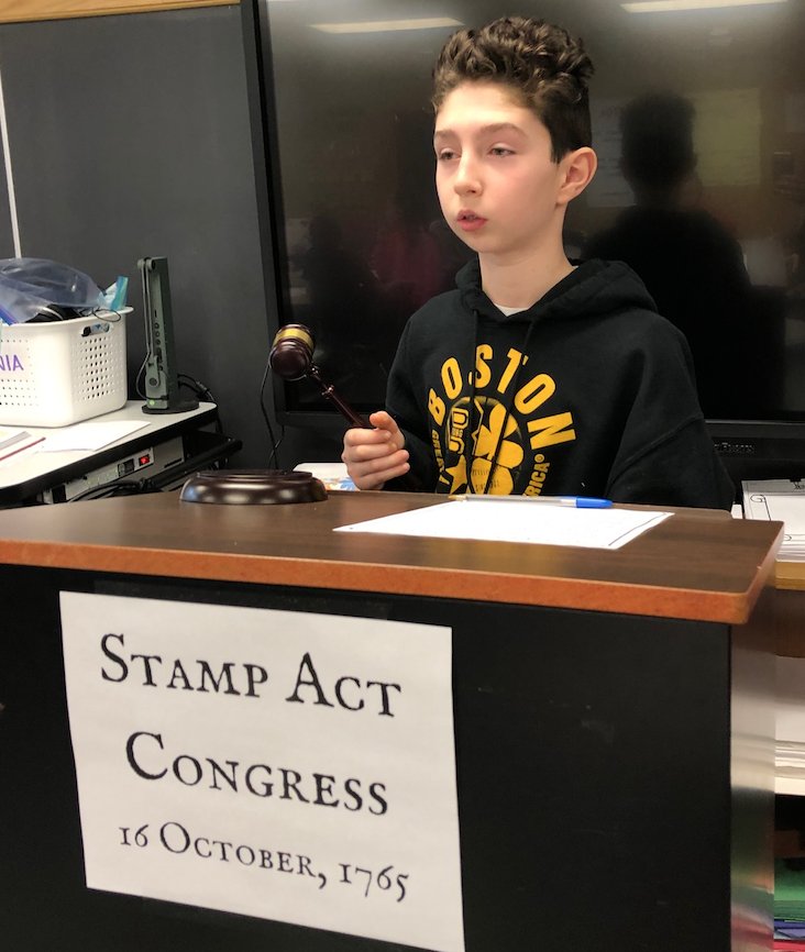MrsValzania's tweet photo. Ss participate in a "Stamp Act Congress" simulation where delegates gather to strategize and persuade neutralists to side with patriots or loyalists as they take their proposals to vote. Order! Order! These patriots are quite the rowdy bunch! @KidsDeserveIt  @LearnLAP https://t.co/Mfpg4RPD9B