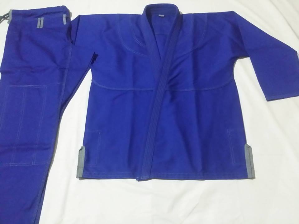BJJ Gi made by 100% Cotton non bleed Pre Shrunk Fabric Pearl weave Jacket with Rip Stop Pant.