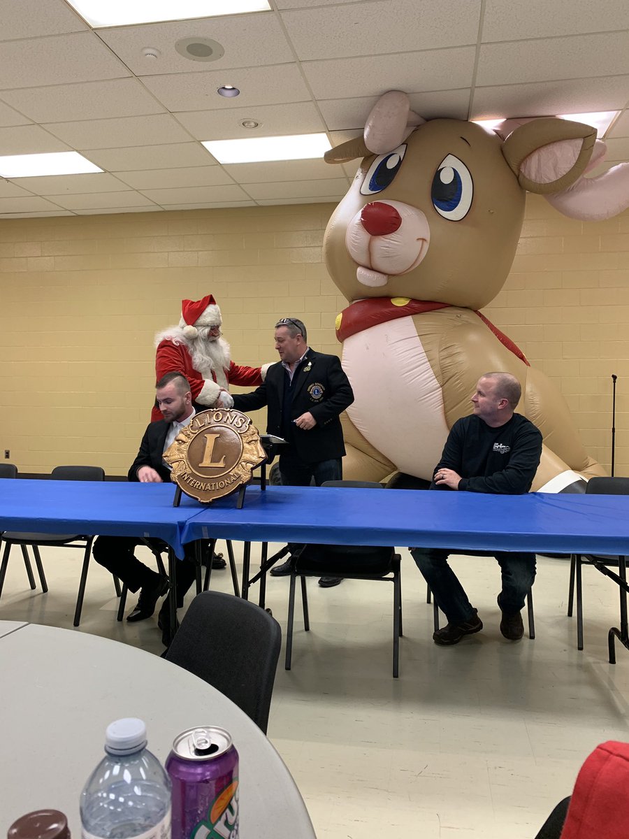LCKitchener's tweet photo. Tonight our club was given a great gift from Edge Electrical Solutions. 4 new generators to replace the ones stolen before last years #KWSantaParade. Thank you so much! Kevin from Edge got to present #Santa with this gift. @lionsclubs #weserve #KWAwesome https://t.co/QGjGL5UyDd