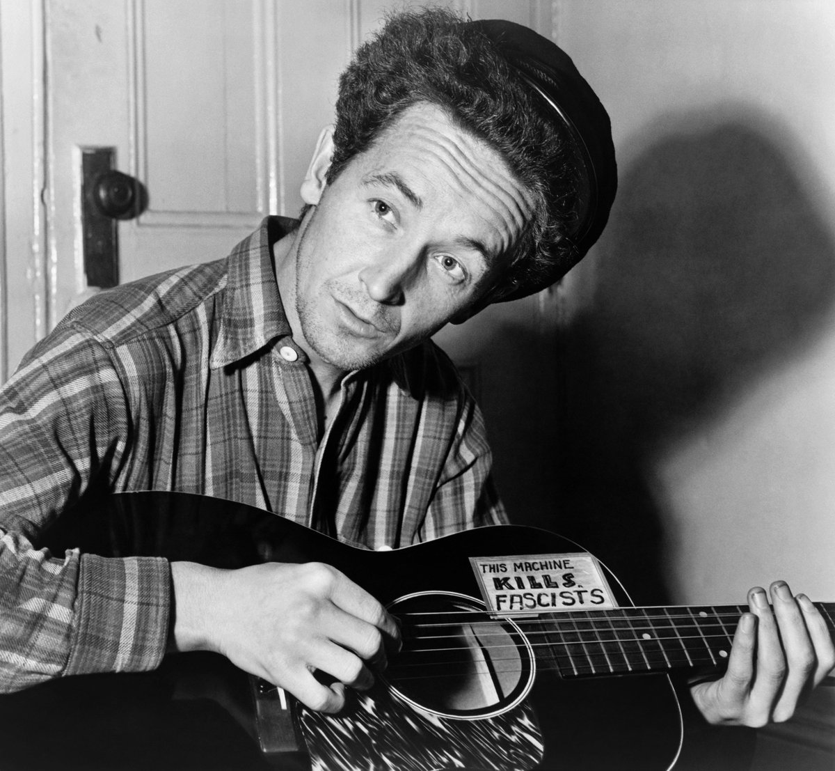 Woody Guthrie and his truth machine.

#RockAndRoll #news #songwriter #politics #guitar #folk #altrock #Resist 
#USA #comcibooks #scifi @PasteMagazine #popculture #photo #books 
#History #writer