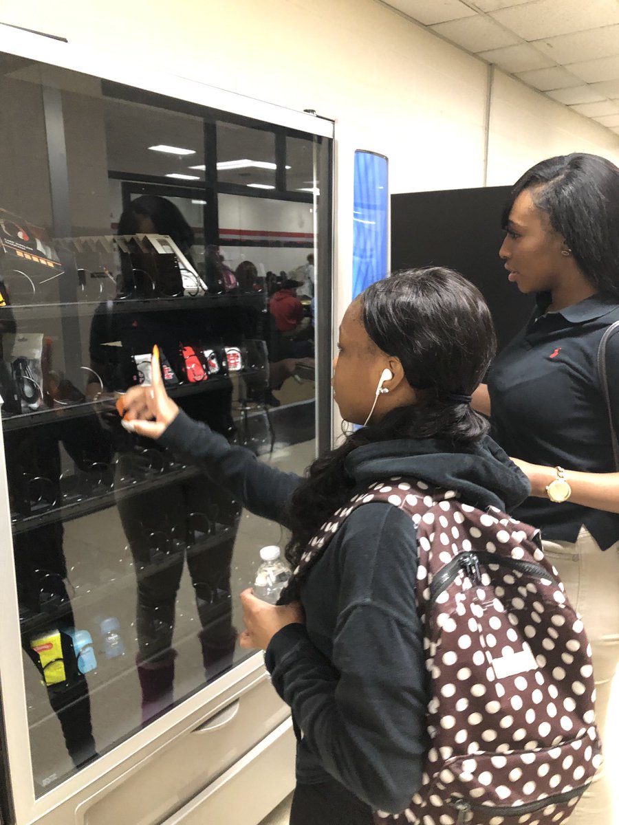 CTEinCHISD's tweet photo. CHHS scholars anxiously waiting to make purchases from the CTE Spirit Box vending machine. #BPA #DECA #CTEinnovation #CHSpiritGear #ConvenientItems @CoachGriffi @CHHS_Leader @cedarhillisd @T_Graham14 @CedarHillDECA @BpaChhs https://t.co/Xw5kVMjeco