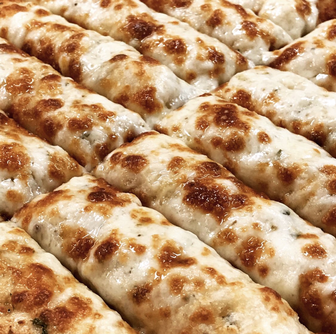 Cheesy Breadsticks. Good alone, great when dipped in our homemade Ranch Dressing! #comfortfood #elkgroveca #eldoradohills #davis #woodland