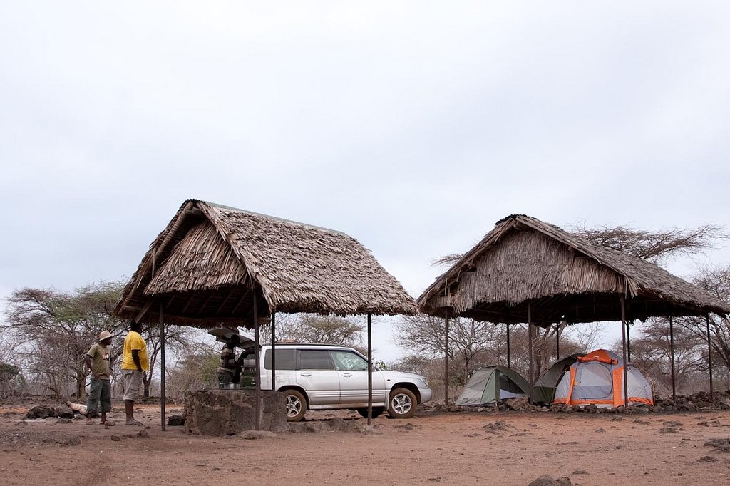 On the second day, we drove to Tsavo via Shetani Lava Flow and camped in an open campsite where the crack of dawn revealed lion paw prints not far from our tents.Such fun!