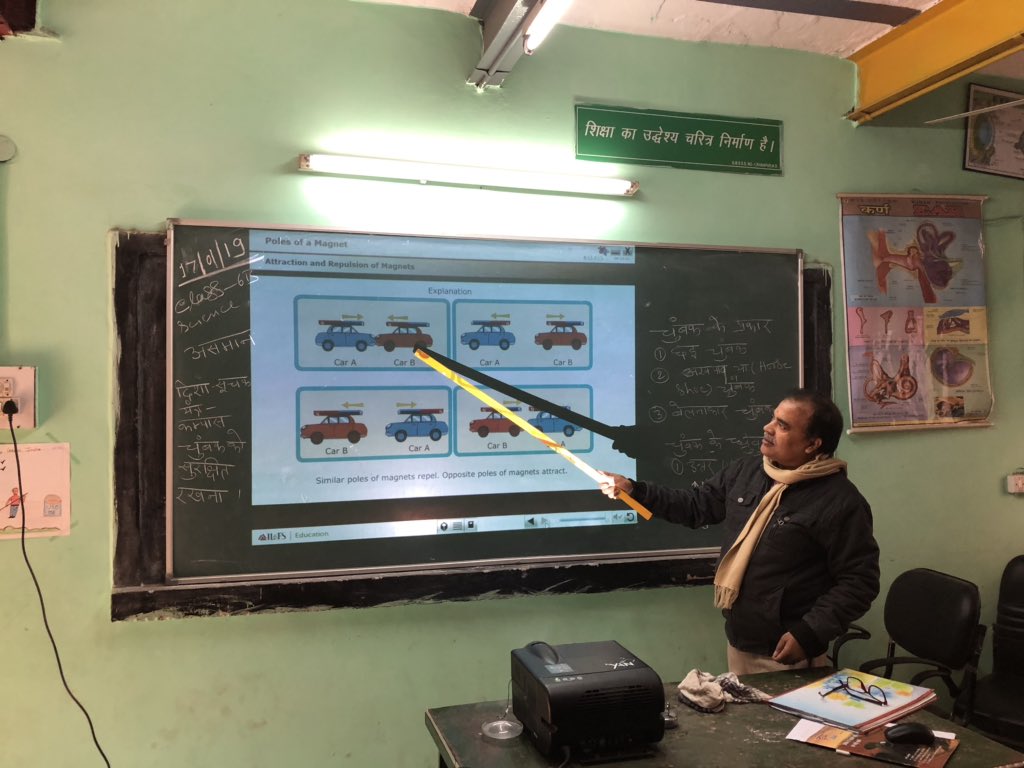 IamCJha's tweet photo. Teachers using kYan projector to explain magnets and its properties #DelhiEducationRevolution #TechnologyinClass https://t.co/UCkHYaFEGw