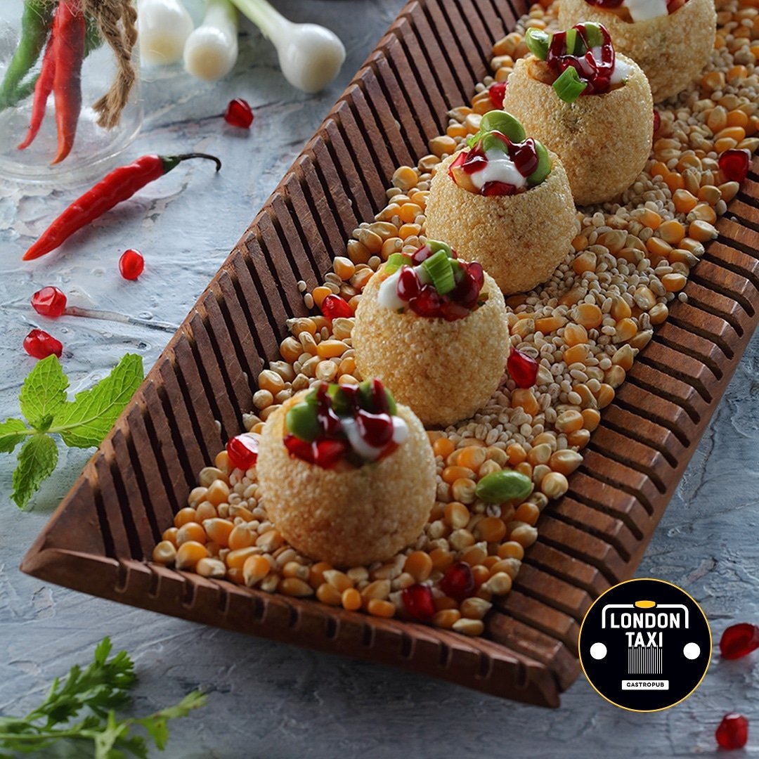 AtLondonTaxi's tweet photo. A puffed poori made out of maize flour and stuffed with smoke roasted sweet potato, corn, edamame, raspberry chutney and spicy yoghurt raita. It's our take on a the famous street food favourite masala poori but with some unique flavour combinations. Do give it a try this weekend! https://t.co/hCbIqkdg19