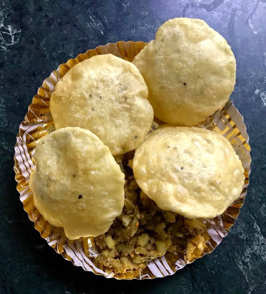 rajesh_tara's tweet photo. On my way to the airport in Kolkata,  #PitStop at the iconic #Putiram for an authentic #Bengali #Breakfast. 

Had a plate of Hing &amp; Urad Dal filled #Kachoris &amp; dry #AlooSubzi,  #MishtiDoi, #GurRoshogulla &amp;  #Sondesh. The pictures below say everything about the #MagicofFlavours. https://t.co/fMKpDfmGec