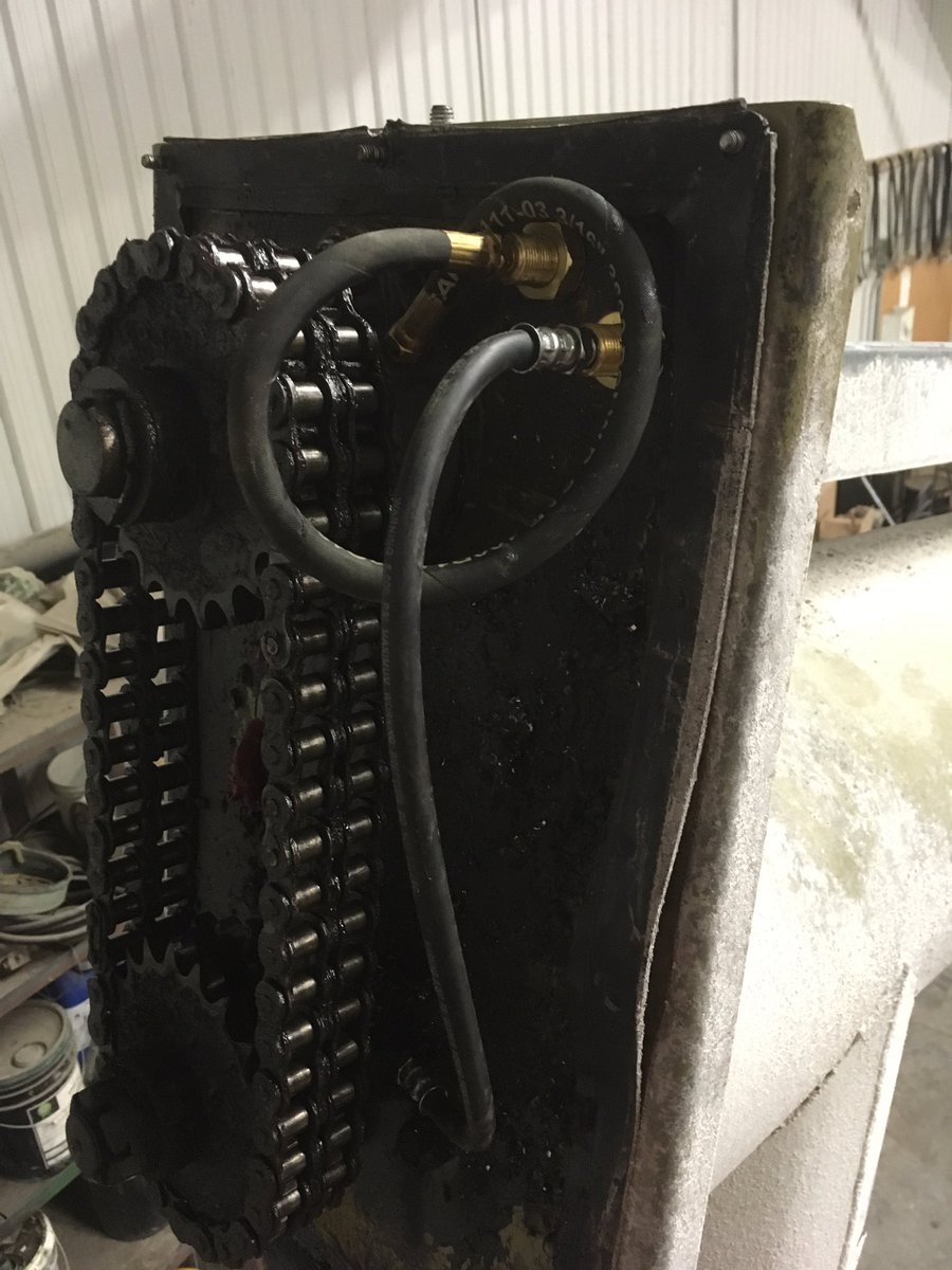 Grease banks on the auger. Making it easier to grease some which can’t be greased without pulling the cover and auger out. #farmgineering