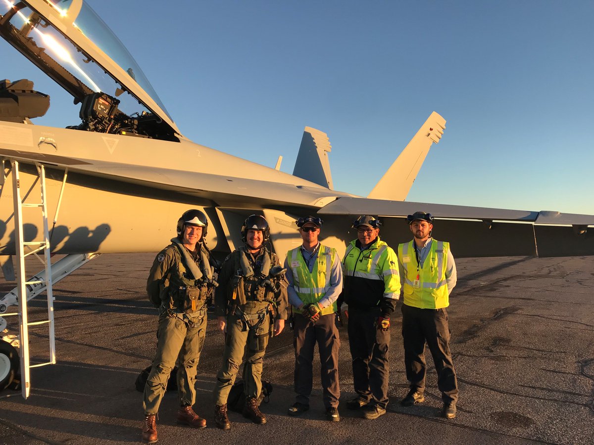 SignatureFBO's tweet photo. Fresh off the assembly line from Boeing in Seattle, this brand new F-18 stopped through Signature SAF for some fuel and food. Pictured: LtCdr USN, Col USMC, SFS Employee Sgt Cory Blaize, US Army (Res), LST’s Ezra Blackbird & Roy Harsher.
#SignatureSoars #F18 #KSAF #avgeek https://t.co/T0h0yQ6alm