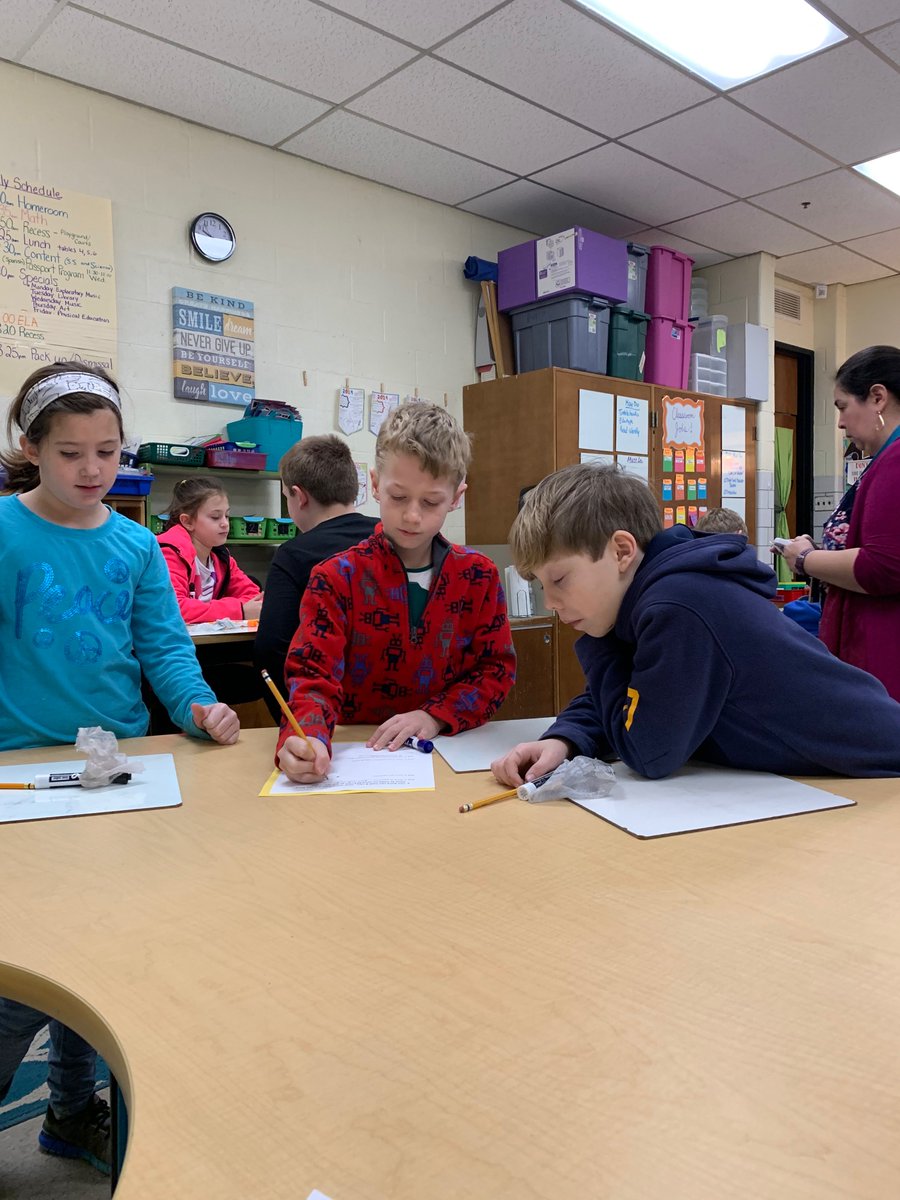 Round robin math.  Students travel around the room completing ONE step of a problem.  They have to review previous work, make corrections as needed, and complete the next step.  Students are learning to analyze work, practice accuracy following procedural steps &amp; collaborate.