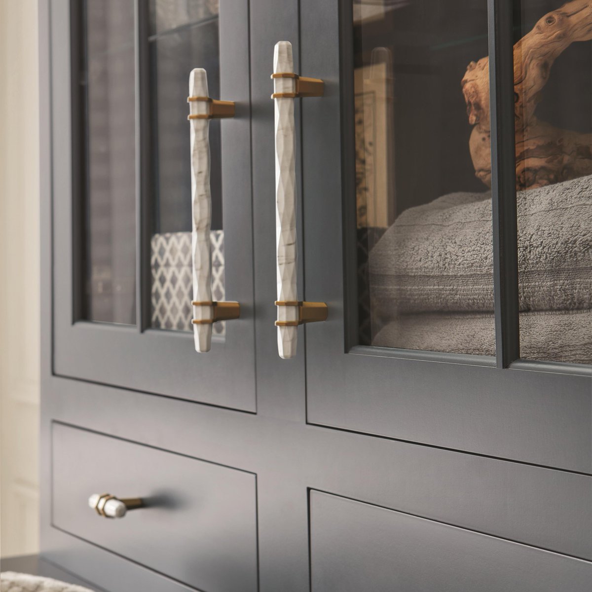 The Carrione collection comes in five different finishes including the popular Golden Champagne. Pair it with bronze or brass faucets and other fixtures!  See all five finishes on our website here ow.ly/4H2M30nkbM6 #interiordesign #interiors #design #cabinethardware