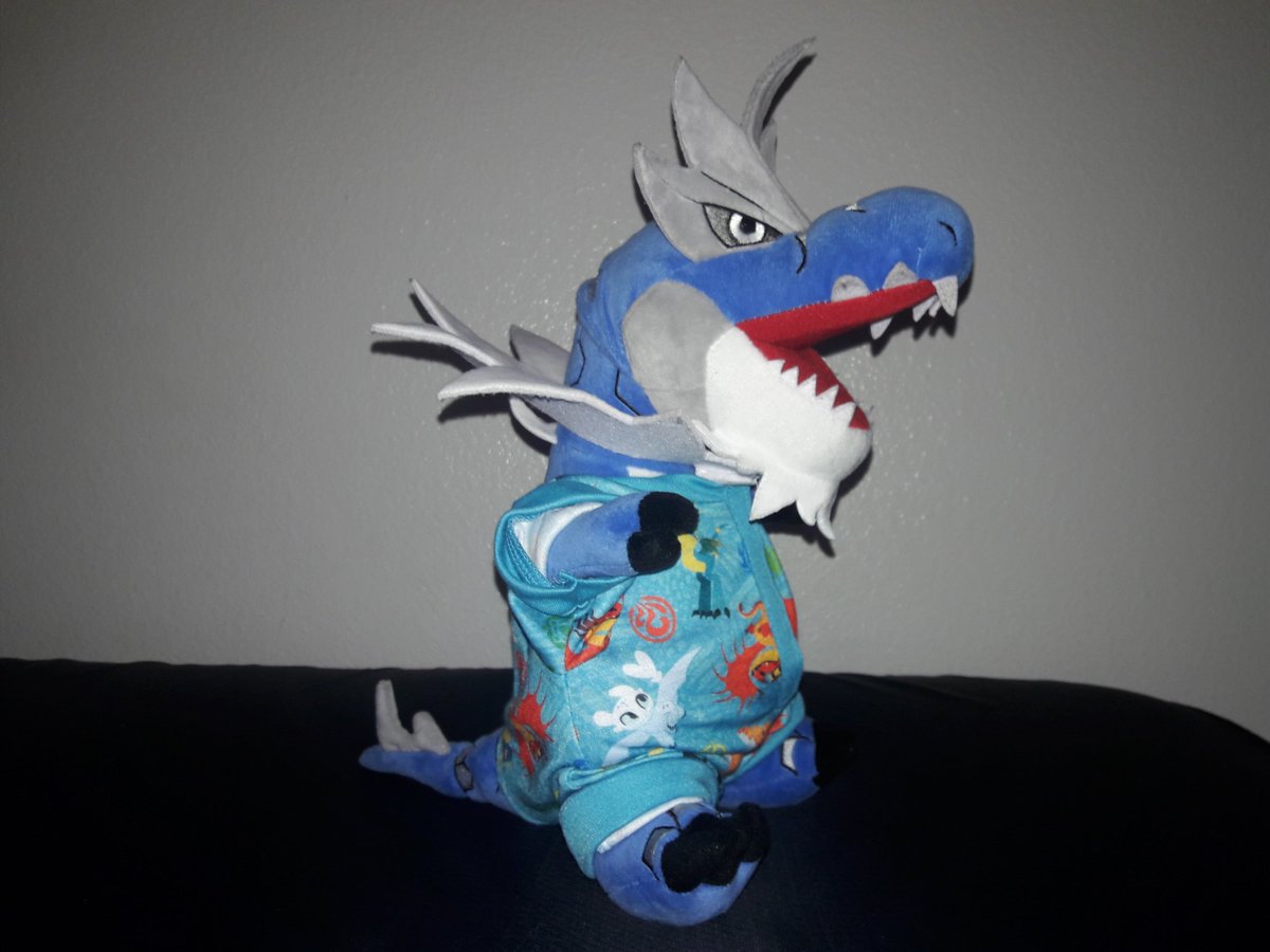GFanactic911's tweet photo. They had these really cute pajamas too &amp; unfortunately they ripped trying to get it on the #LightFury but I found use for it. 😅😊 He may not look like a dragon, but he's a dragon type so it works. 🤣 👌🏼👍🏼#Pokemon #Tyrantrum #ShinyTyrantrum #Plushies #HTTYD #HowToTrainYourDragon https://t.co/OIf0JOW64m