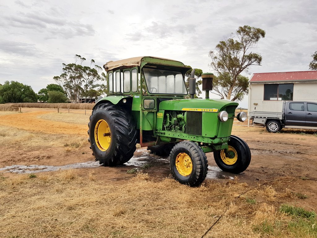 Good chance to get a photo of the lineup before the 9100 heads off. 4020 was Pa's first john deere, bought back at a rotary auction a few years ago.

4020, 4440, 6810, 6930, 9100, 8370r