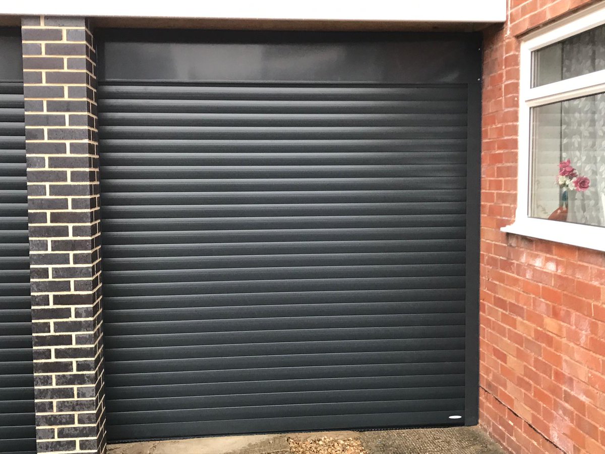 GarageDoorsSW's tweet photo. Another lovely @alluguard Insulated Roller Door installed in Honiton, next door to a door we installed in December, #greatjob #welldoneguys #looksamazing #teamworkmakesthedreamwork #alluguard #gdsw https://t.co/koiF824Dk0