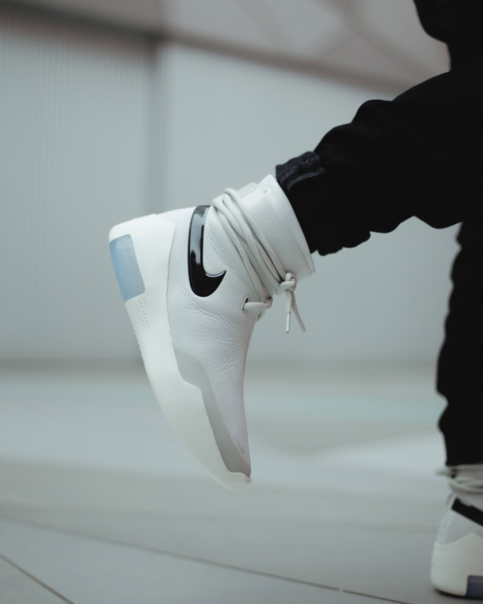 nike x fear of god on feet