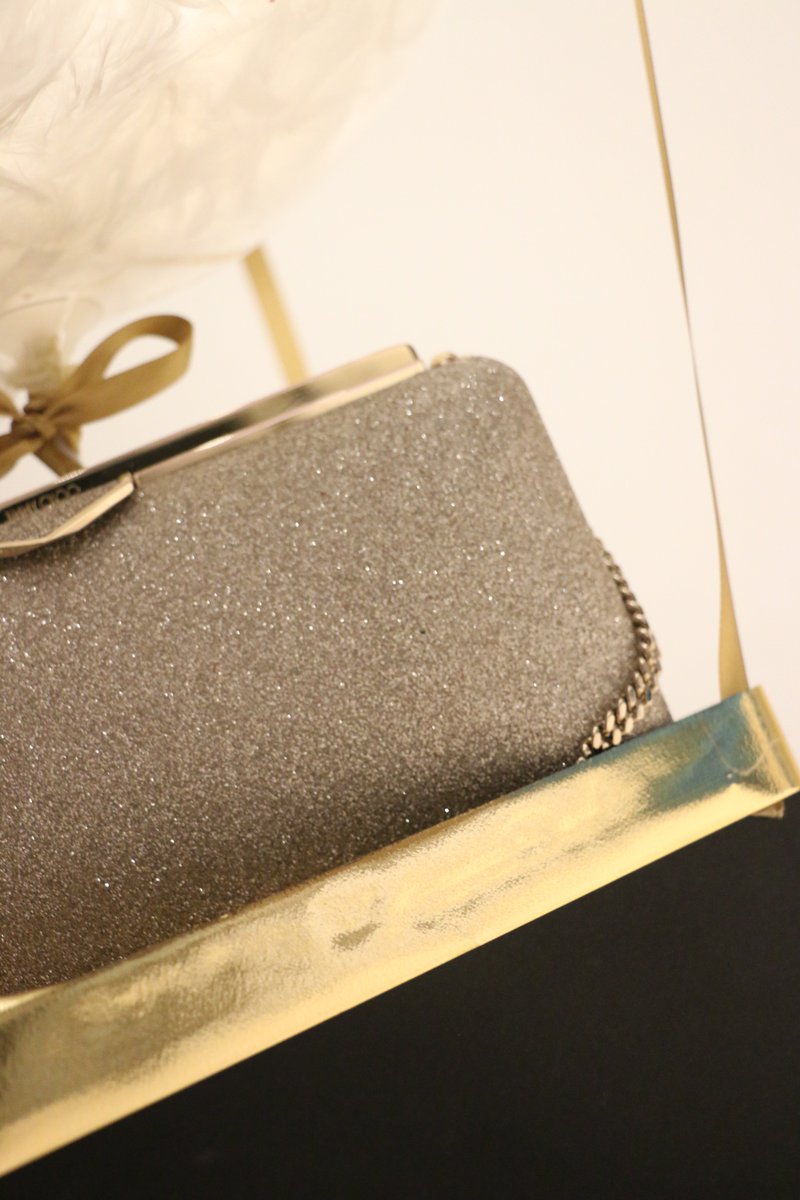 Our balloon bouquets were used as a carrier to gift a beautiful <a href="/jimmychoo/">Jimmy Choo</a> clutch bag. #bespokeballoons #giftballoons #balloonbouquets