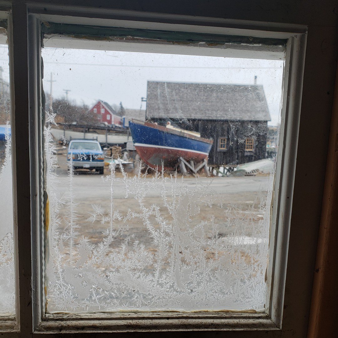 DoryShop's tweet photo. The #DoryShop through the frosted window of the #LunenburgChandlery. Yes, it's #cold here in the #Lunenburg this morning! https://t.co/wGI3fP3PgD
