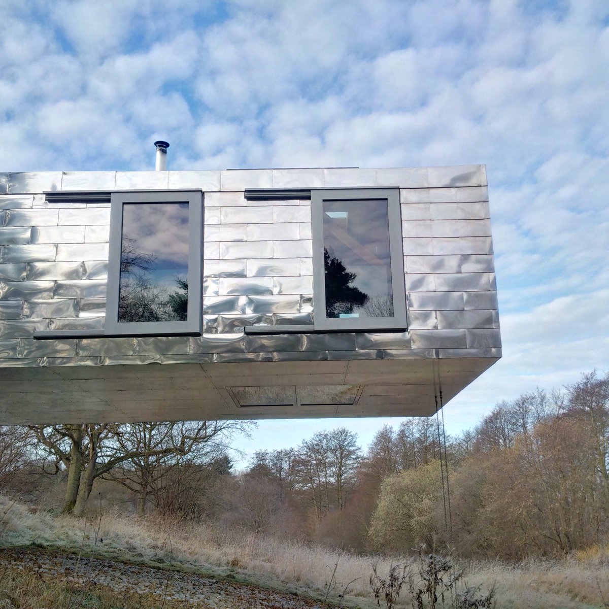 LivingArch's tweet photo. Embrace winter at #BalancingBarn. If it's too cold to swing from the cantilever, you can sit by the fire and watch the wildlife in the nature reserve right outside. Book now and work-from-home here from 21- 25 January, or enjoy a 3 day weekend (25-28 Jan). https://t.co/evQ7DE3Xcl https://t.co/OVKWg9jzfN
