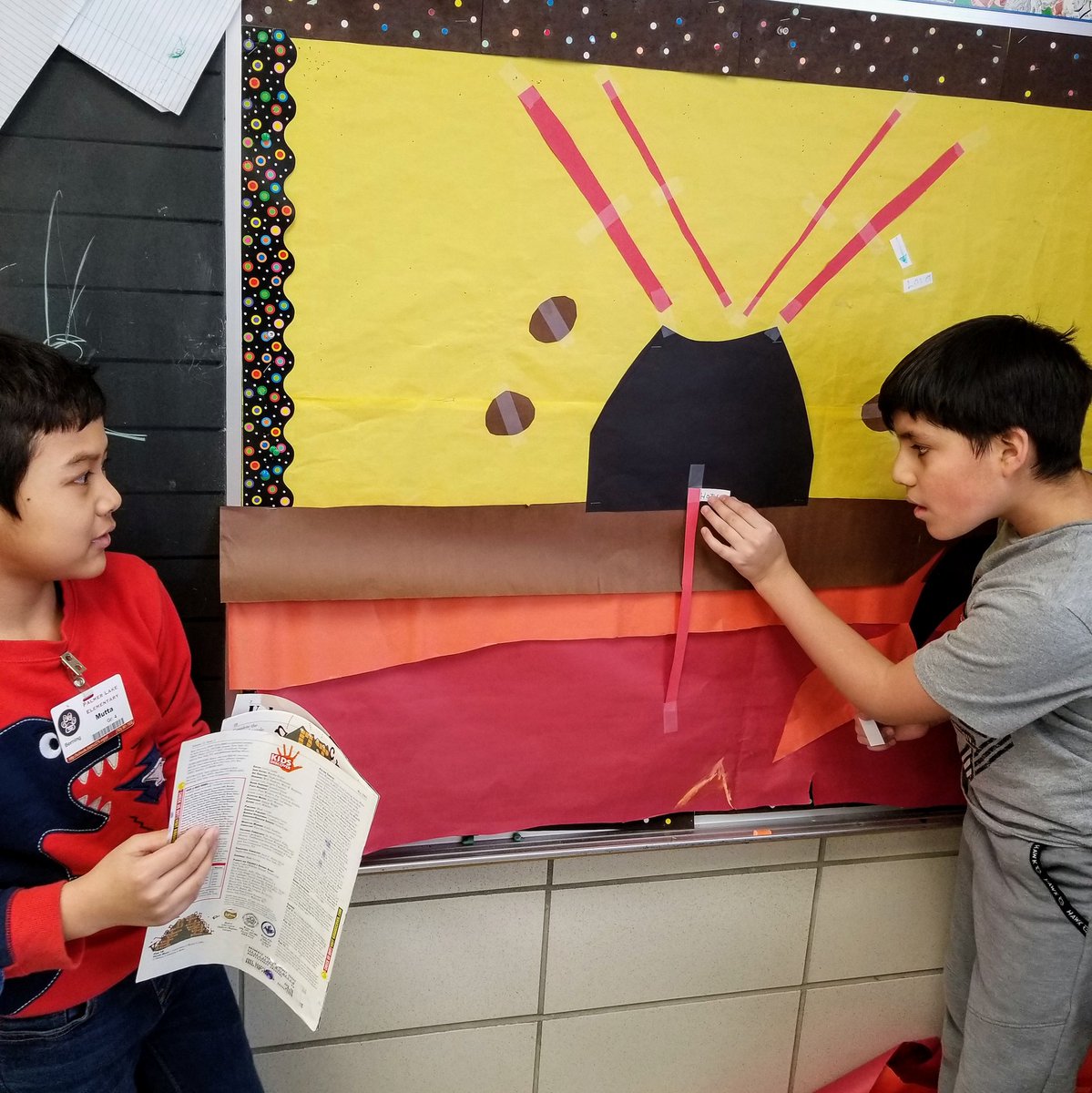 Learning about volcanoes as they learn English